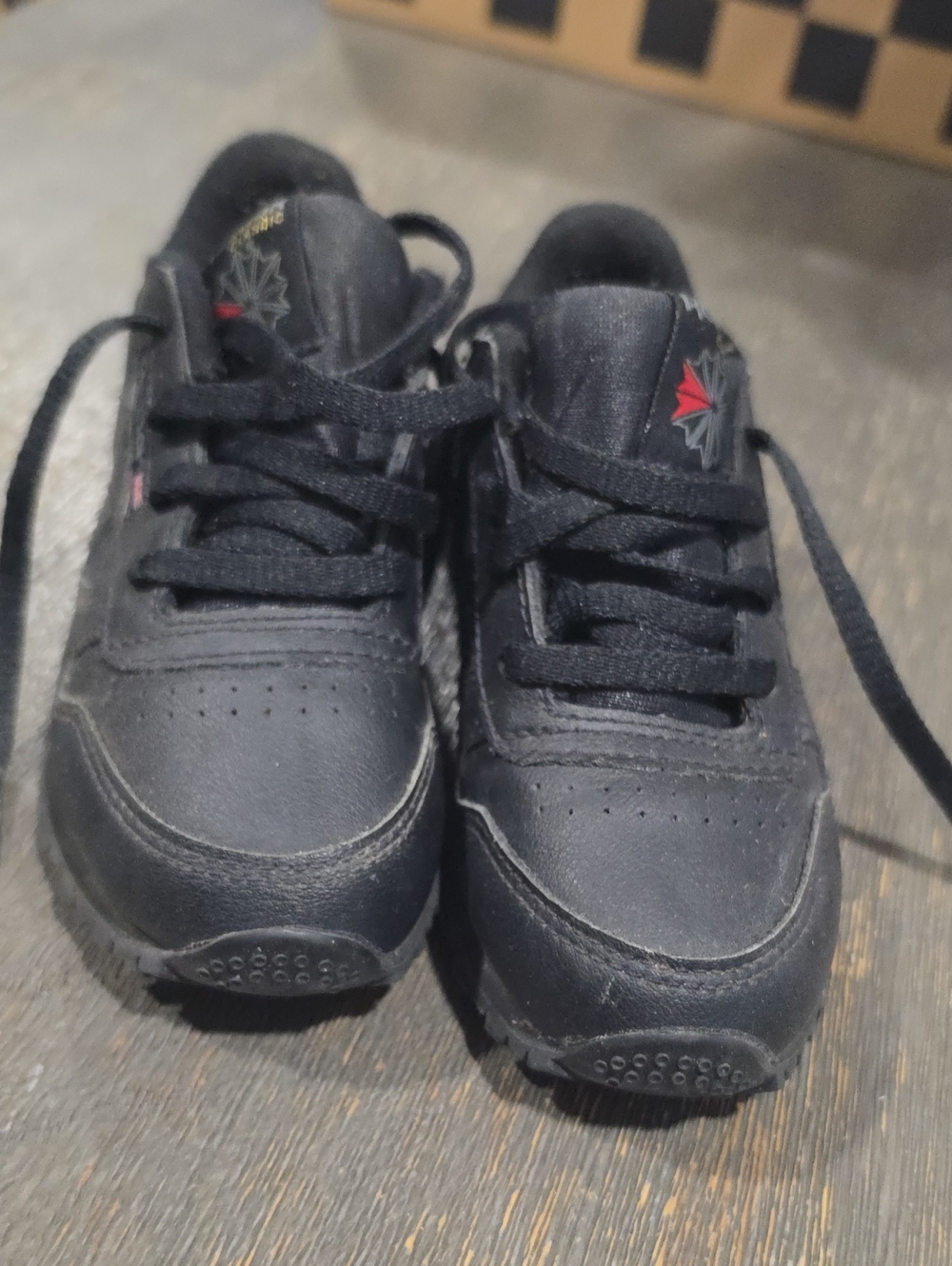 Reebok Kids Black Sneakers with Red Accent
